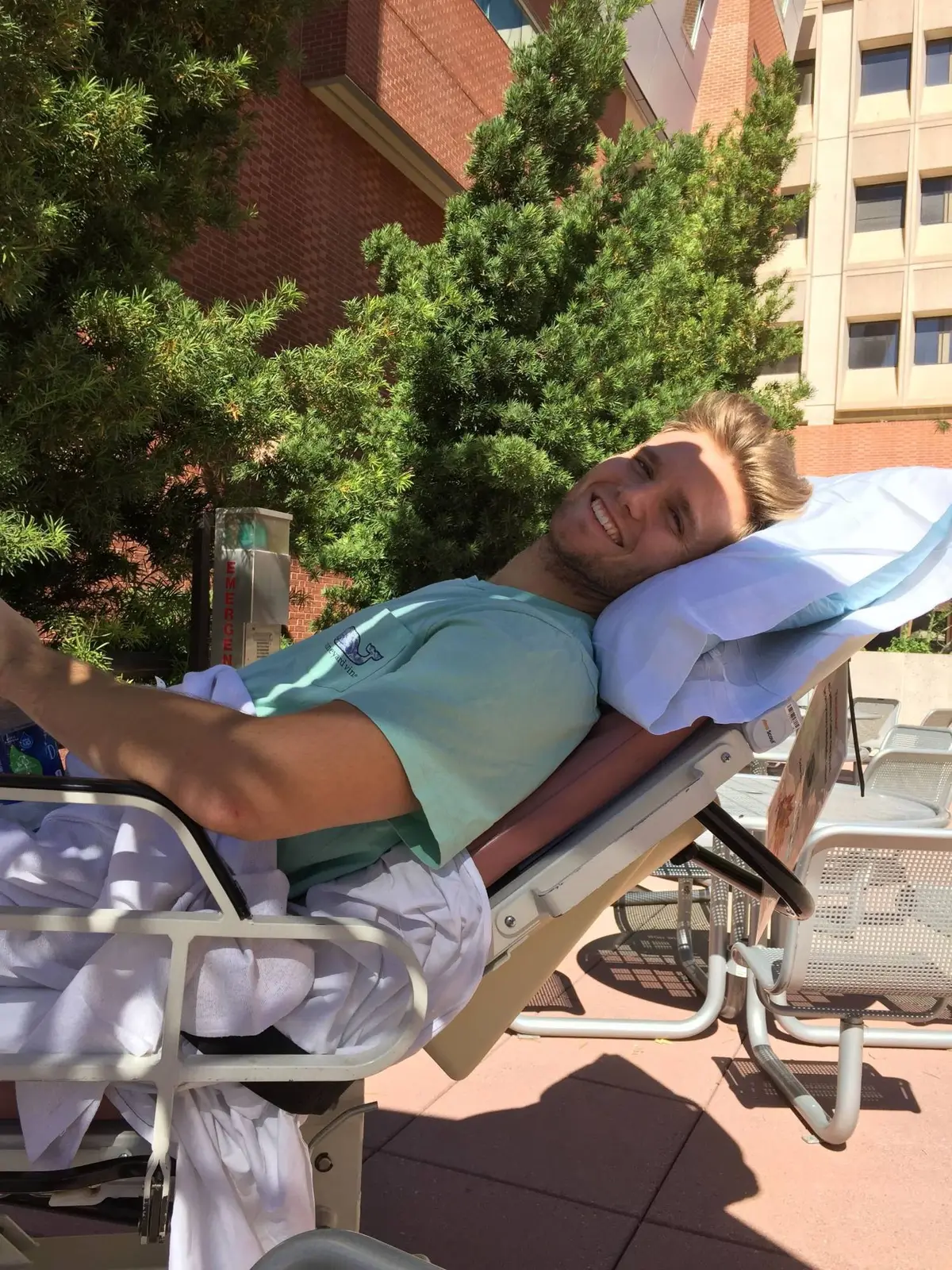 Ian recovering outside the hospital
